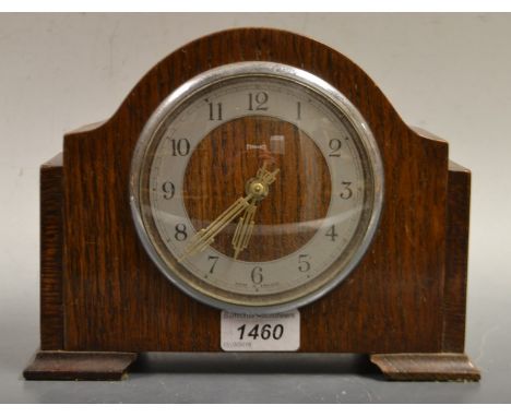 A Ferranti oak cased mantel clock, electrical movement, Arabic numerals