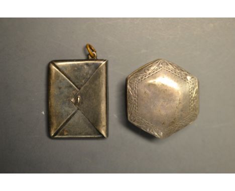 A stirling silver envelope stamp case; a hexagonal patch box