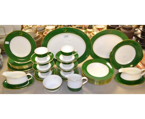 A Royal Crown Derby six setting dinner and tea service, commissioned by the Pakistani Diplomatic Corps. for use in their emba