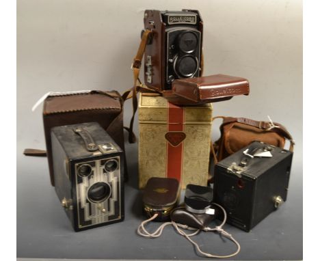 Cameras - a Rolliecord twin lens camera, leather case, original box; light meter; a Kodak Brownie, No.0, 127, made in Canada;