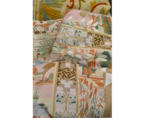 Textiles - a crewel work woollen hand stitched panel, a pair of cotton curtains, titled Isadora, 1920's ladies in floral gard
