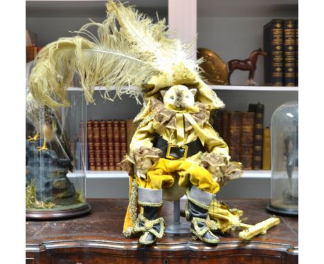 Toys and Juvenalia - A Puss in boots puppet dressed in pan velvet ,lace and ostrich feathers 