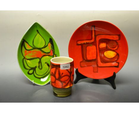 A Poole dish decorated in bold abstract autumnal colours; others similar (3)