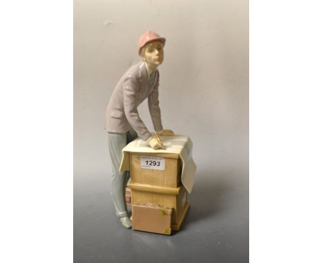 A Lladro figure of a building surveyor