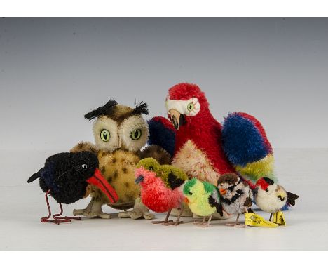 Steiff post-war Birds: a Lora parrot with multicoloured mohair, rubber beak and chest tag - 43?4in. (12cm.) high; a Wittie ow