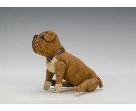 A Steiff burlap jointed bulldog circa 1910, with black boot button eyes, black stitched nose, mouth and claws, swivel head, w