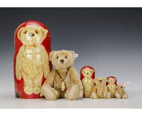 A Steiff Limited Edition rare Matrioschka Teddy Bear set, 513 of 750 pieces, three graduating hand turned and painted Russian