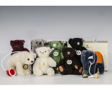Eight Steiff Club Gift miniature Teddy Bears: 2006, 2007 elephant, 2008 to 2012 and 2014, in original boxes (one cellophane m