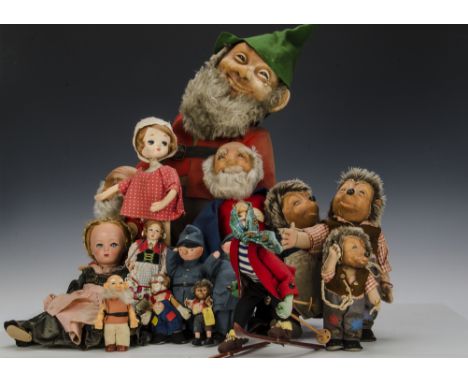 Steiff post-war rubber headed characters: a small Clownie-41?4in.(11cm.) high; three Mecki and one Micki; two Pucki; and Shep