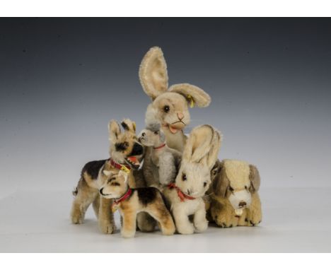 Post-war Steiff rabbits and dogs: jointed Niki Rabbit - 91?4in. (23.5cm.) high; two Arco standing German Shepherd; another ra