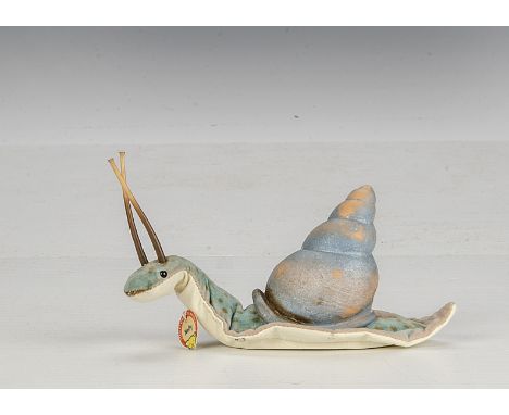 A rare Steiff Nelly Snail, 1961-63, with turquoise spotted velvet body, vinyl shell and antennae, leatherette underside, scri