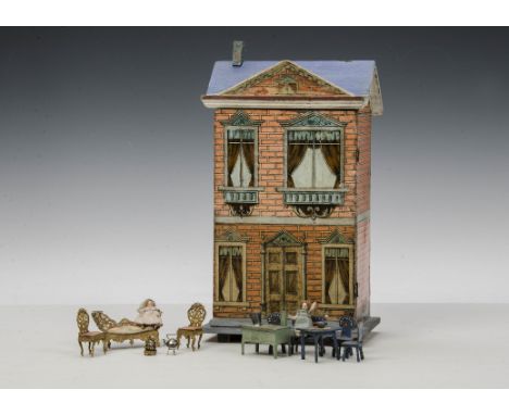 A small German blue roof dolls’ house probably Gottschalk, wood covered in printed paper with brick façade, fancy windows and