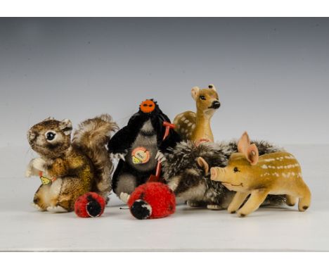 Steiff post-war Woodland and Field animals: a Maxi mole with spade, script button and chest tag - 41?4in. (10.5cm.) high; a J