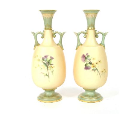 A pair of Royal Worcester vases, painted with river views with blue details, printed marks and numbered 1963, 21.5cm high