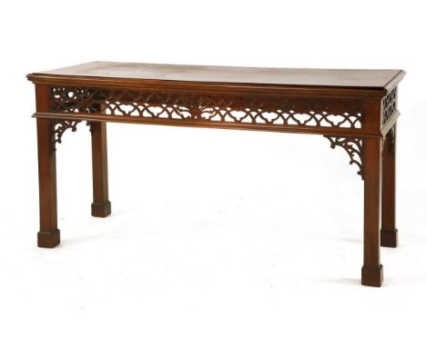 A mahogany hall table, 19th century, with a plain rectangular top, over a pierced Chippendale frieze, 154cm wide, 62.5cm deep