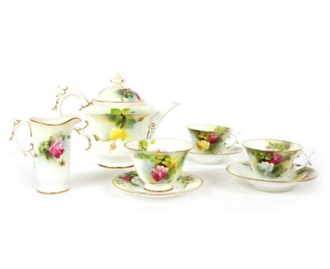 A Royal Worcester tete-a-tete tea set