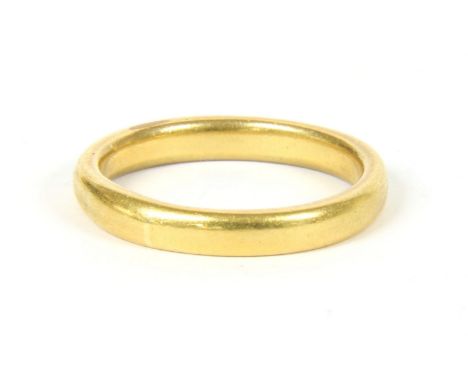 A gold wedding ring, (marks rubbed) , tested as approximately 22ct gold, 7.62g