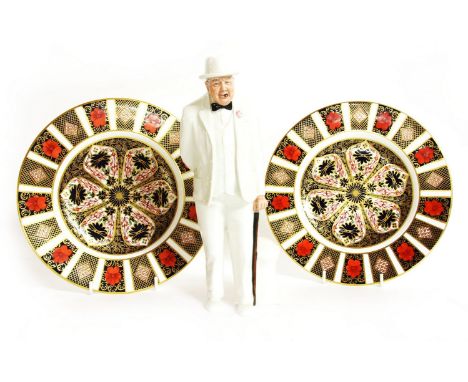 A pair of Royal Crown Derby imari plates, 23.5cm diameter, a Royal Doulton Churchill figure, modelled by Adrian Hughes, HN305