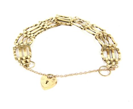A 9ct gold four bar gate link bracelet, with padlock, 9.11g