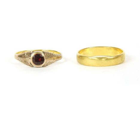 A 22ct gold wedding ring, London 1692, 3.72g, and a single stone garnet ring, with replacement shank, 2.15g