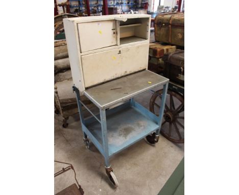 A vintage enamel nursing trolley 