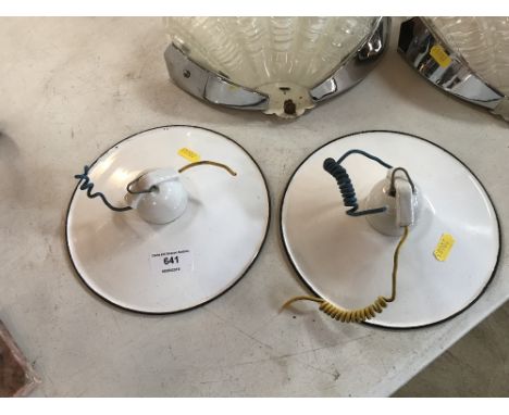 A pair of 20th Century enamel ceiling lights 