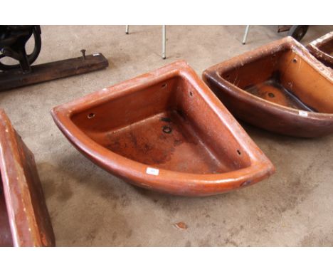 An Oats & Green of Halifax glazed stoneware corner horse trough