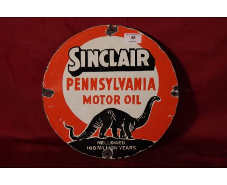 A circular enamel "Sinclair Pennsylvania Motor Oil" sign, 12" dia.