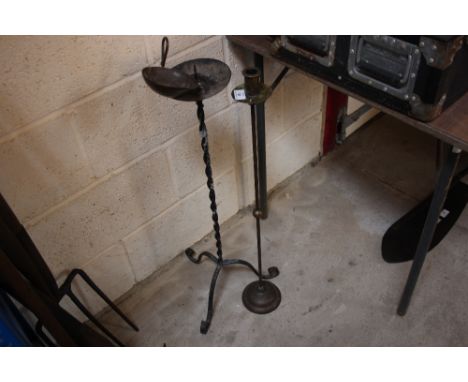 An old floor standing metal candle stand; another similar and a part lamp