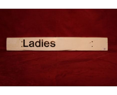 A vintage enamel railway sign "Ladies", 5" x 34&frac12;"