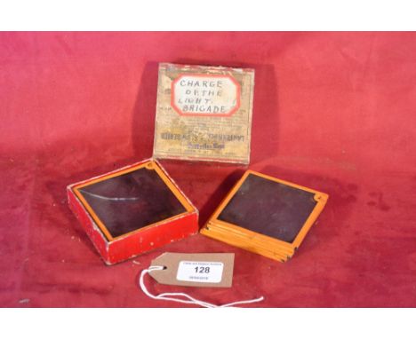 A boxed set of twelve Magic Lantern slides depicting The Charge of The Light Brigade 