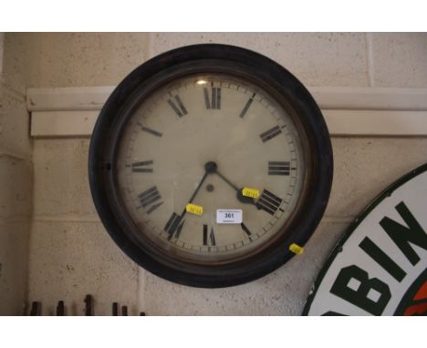 A Victorian circular wall clock with white enamel Roman numeral dial 