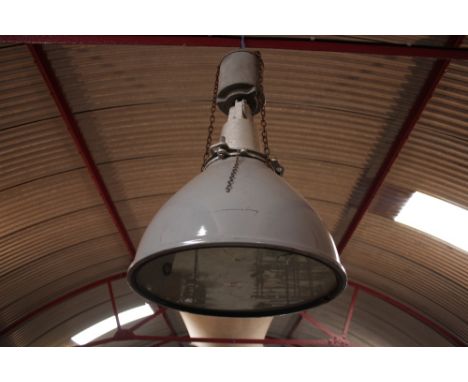 A large grey hanging industrial lamp 