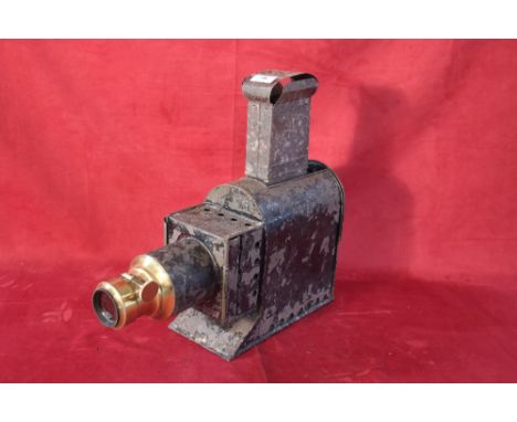 A metal and brass mounted Magic Lantern with original fitments 