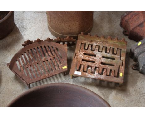 An unusual cast iron fire grate; another and a cast iron grate front