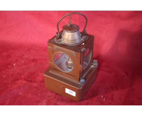 A brown Midland Railway lamp in perfect condition with brass burner