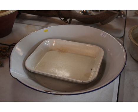A circular enamel cream pan and two enamel trays
