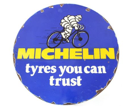 A circular double sided enamel "Michelin Tyres You Can Trust" sign, 30" dia.