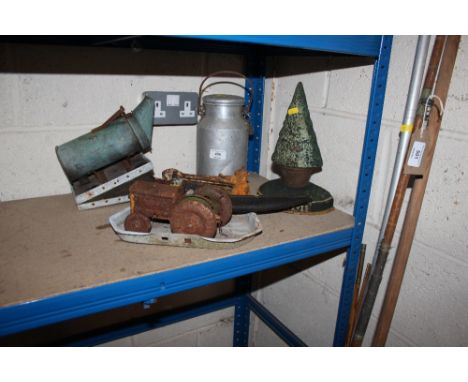 A small milk churn; a bee smoker; a model of a tractor; a Kukri knife; iron letterbox etc. 