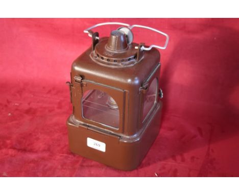A brown Midland Railway lamp in perfect condition with ceramic burner