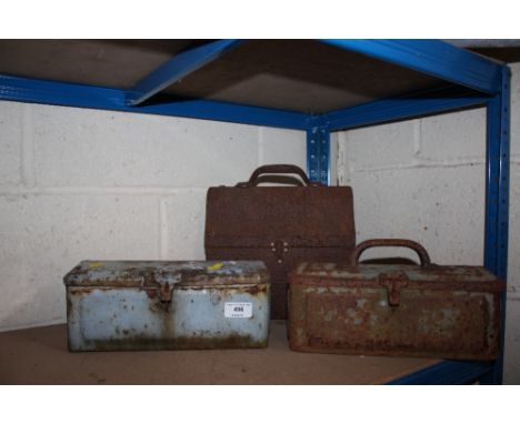 Two vintage tractor tool boxes and an old biscuit tin