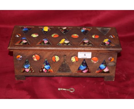 An Art Deco design wooden trinket box decorated enamel inserts (some missing)