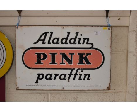 An enamel advertising sign for "Aladdin pink paraffin", 14" x 21"
