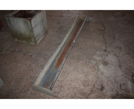An 8' galvanised feed trough