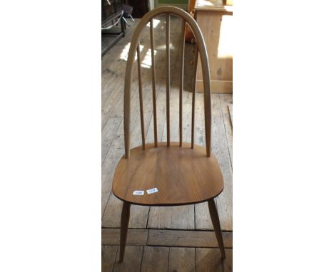 A light Ercol spindle back chair