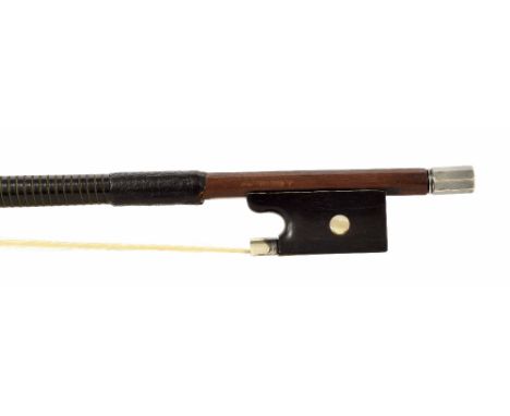 Silver mounted violin bow stamped J. Brown JNR, the stick round, the ebony frog inlaid with pearl eyes, with sterling silver 