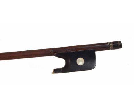 Silver mounted violoncello bow stamped Bazin, the stick round, the ebony frog inlaid with large pearl eyes and the ebony adju