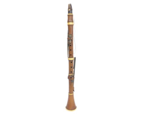 Boxwood and ivory clarinet by and stamped Bates, Ludgate Hill, London, with six square brass keys on wooden blocks