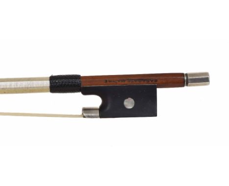 Silver mounted violin bow by Thibouville Lamy and stamped Sarasate Maitre, the stick round, the ebony frog inlaid with pearl 