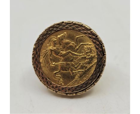 A George V 1915 half sovereign gold coin, London mint, mounted in a 9ct. gold ring, size UK K. (total weight 8.0g)